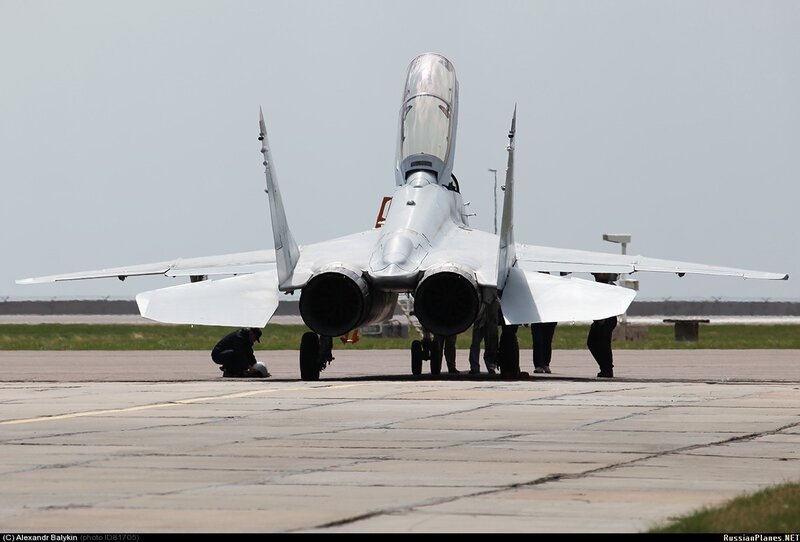 Military Jet on Tarmac — Gray, Neutral, Afternoon, Photograph, Aircraft, Personnel, White