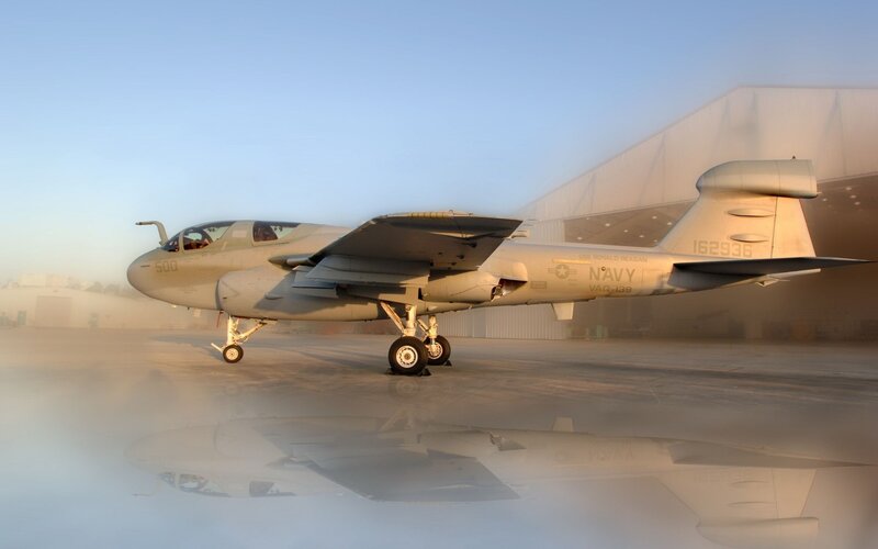 Military Jet on Tarmac — Gray, Serene