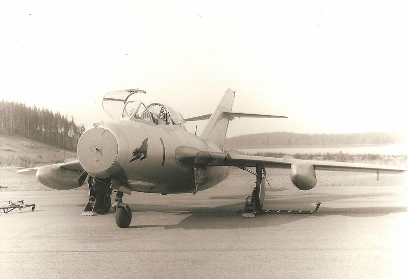 Military Jet on Tarmac — Gray