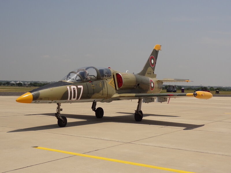 Military Jet on Tarmac — Green, Calm