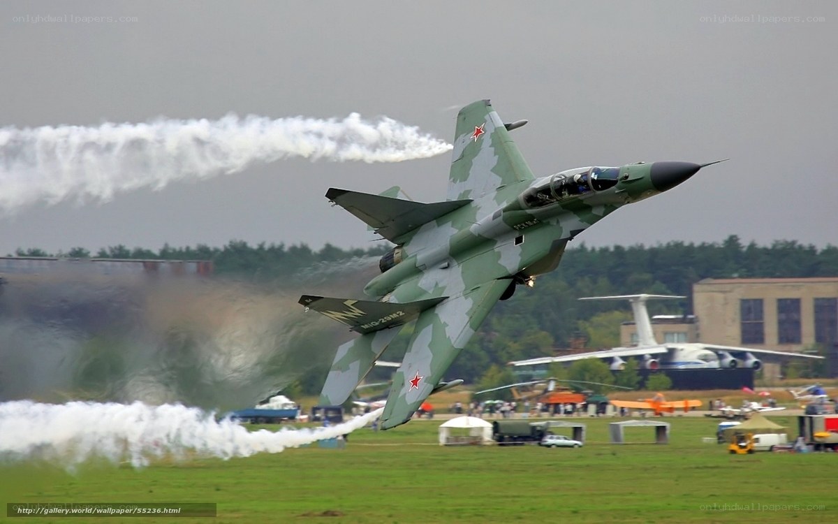 military jet performing aerobatics