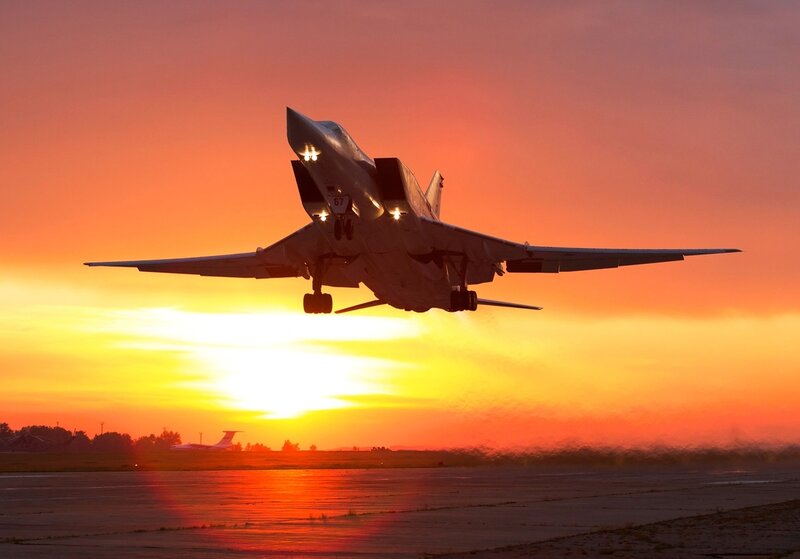 Military Jet Taking Off — Orange