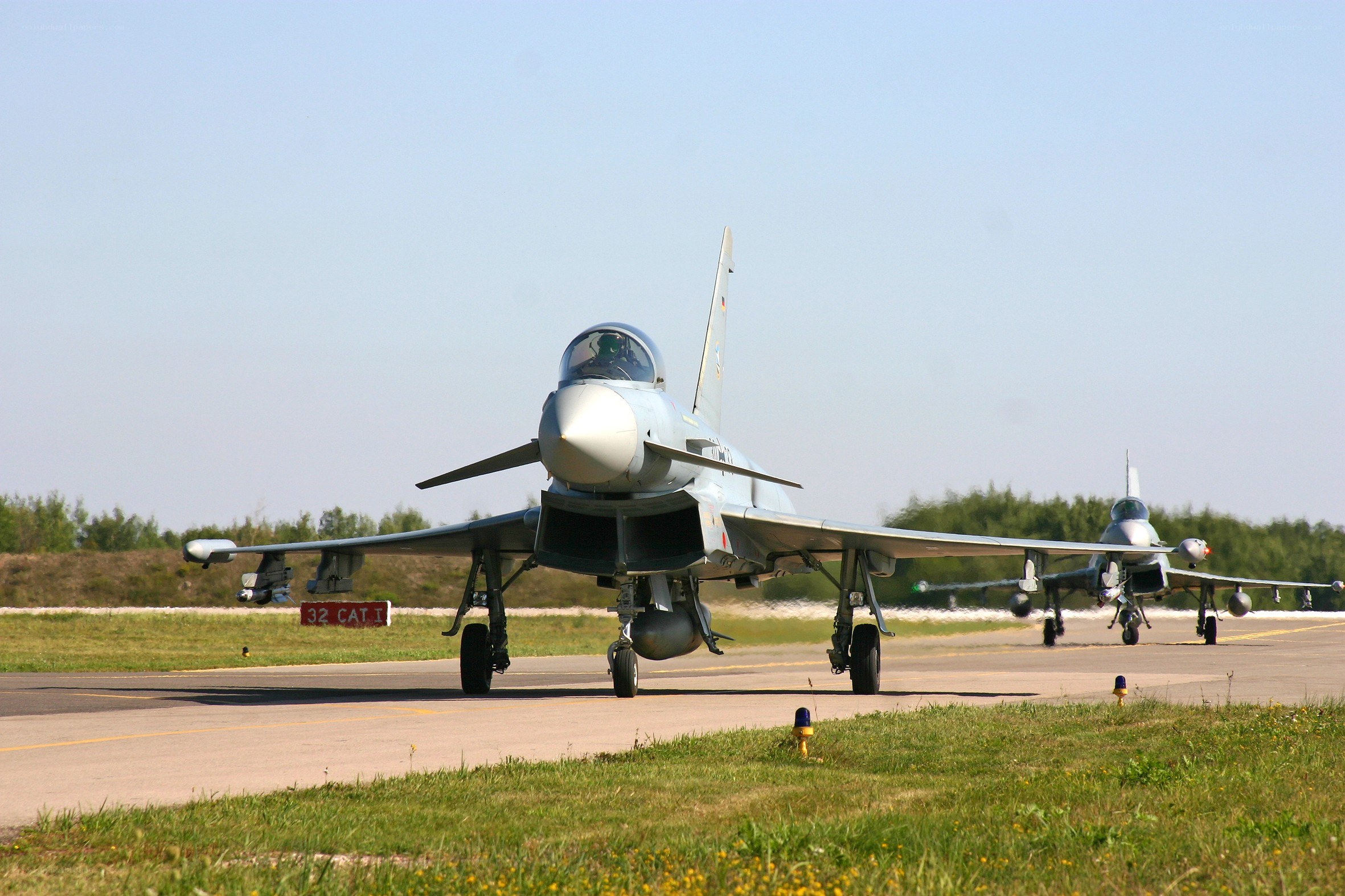 Military jets on a runway