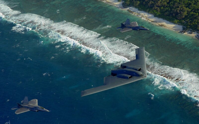 Military Jets over Ocean — Blue