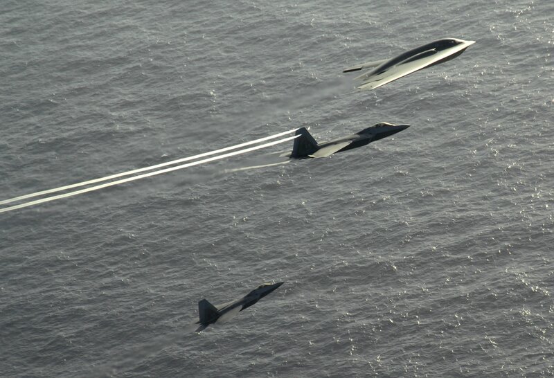 Military jets over ocean