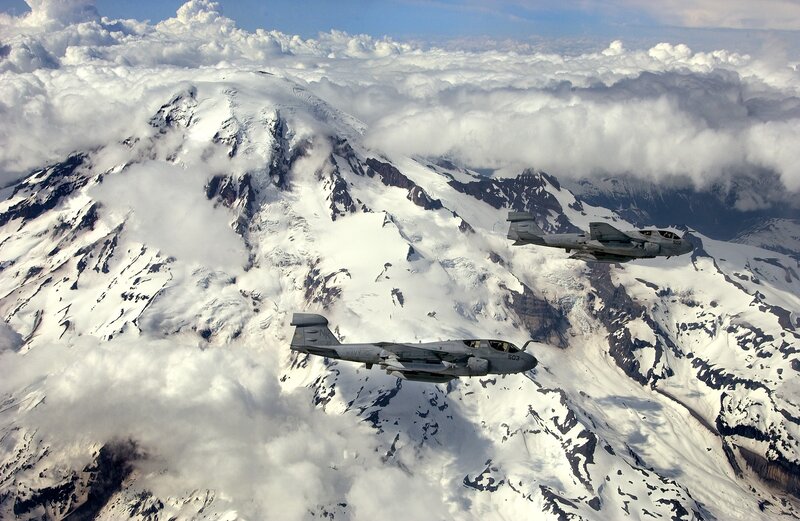 Military jets over snowy mountains