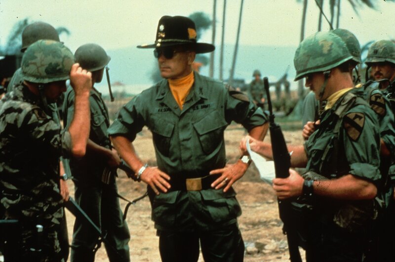 Military officer with soldiers