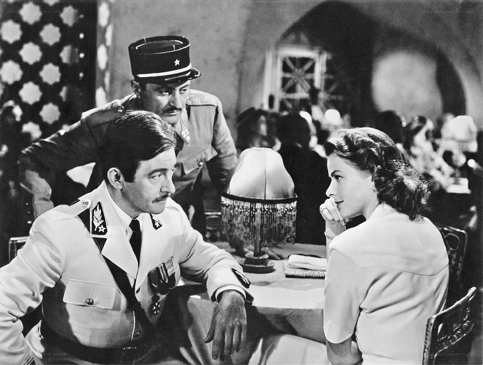 Military officers and woman at table