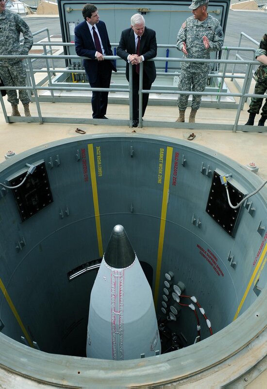 Military officials inspecting missile silo