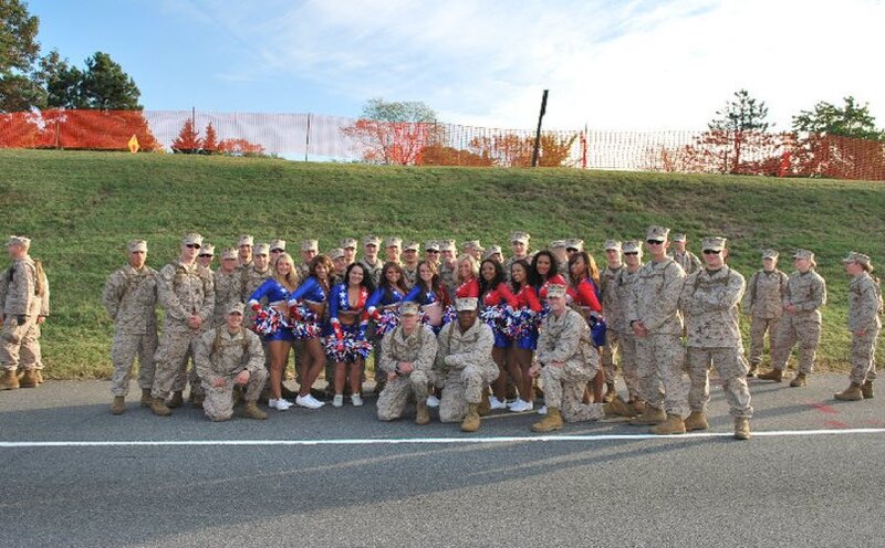 Military Personnel with Cheerleaders
