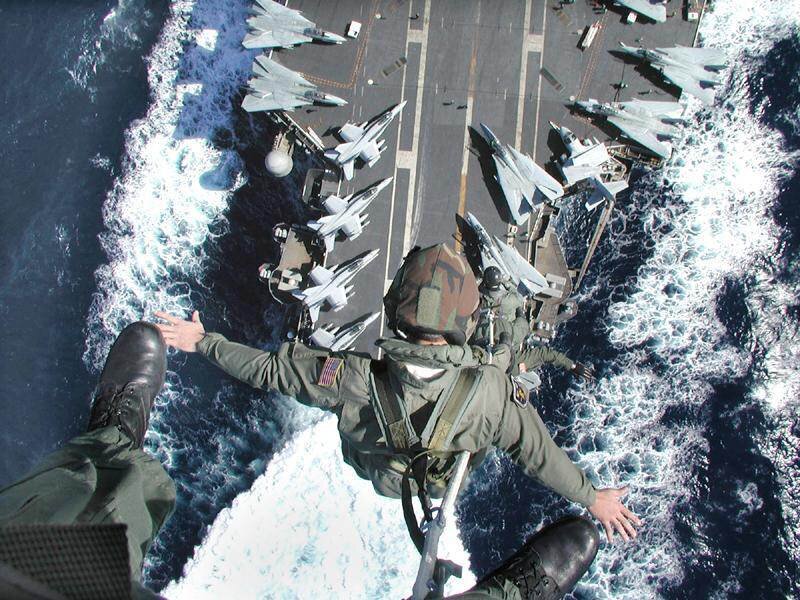 Military pilot on aircraft carrier