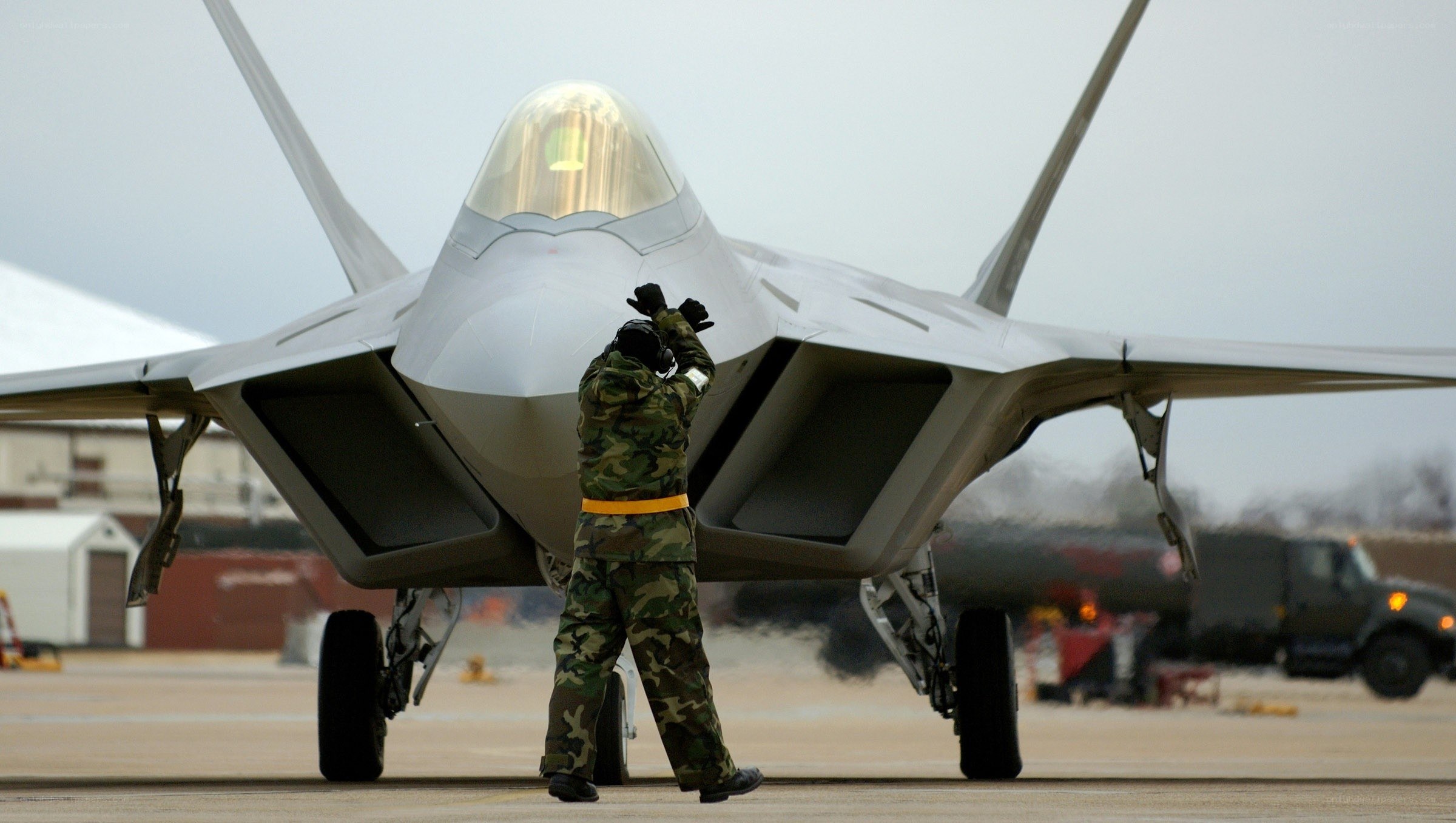 Military pilot preparing for flight