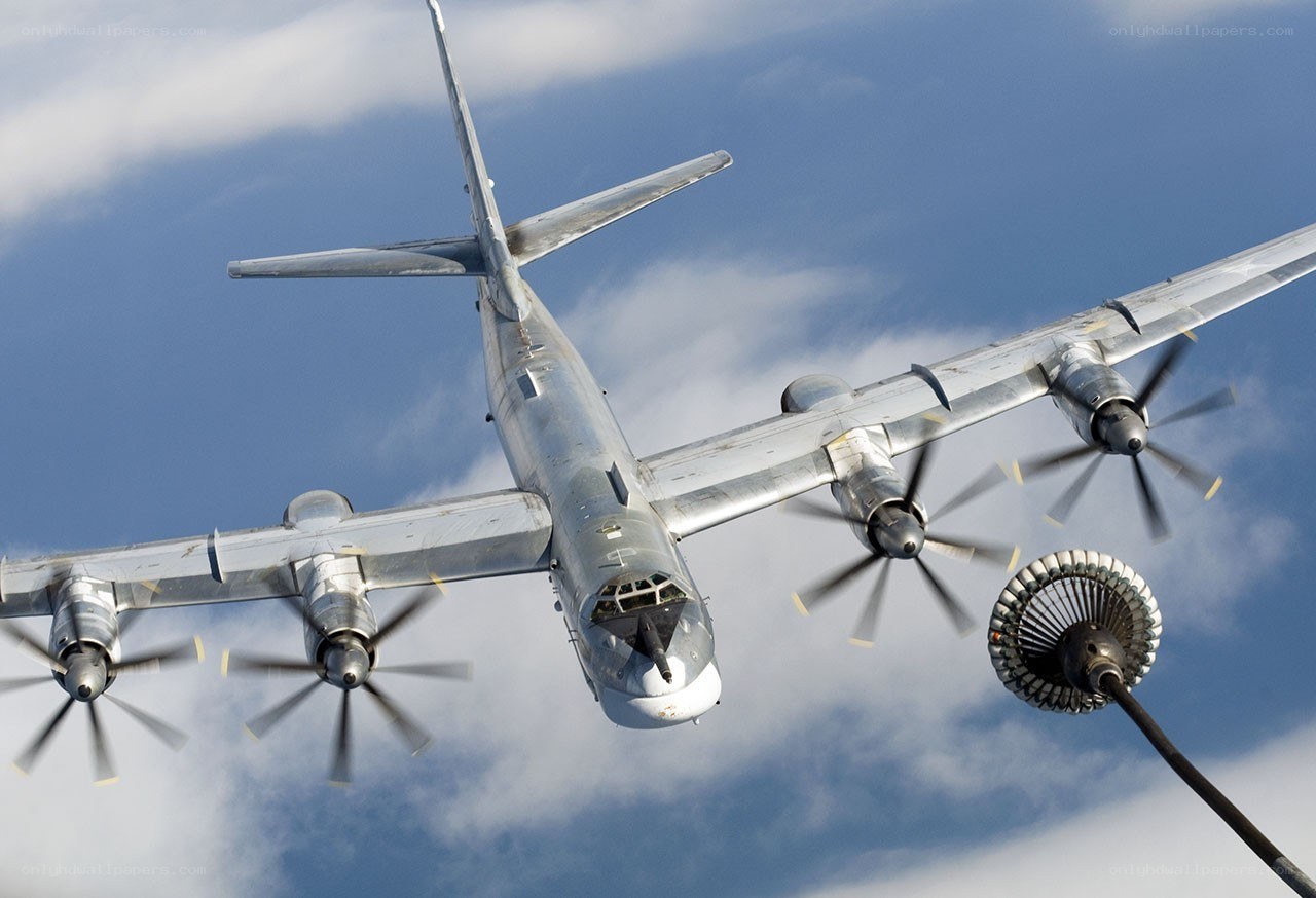 military plane refueling in flight