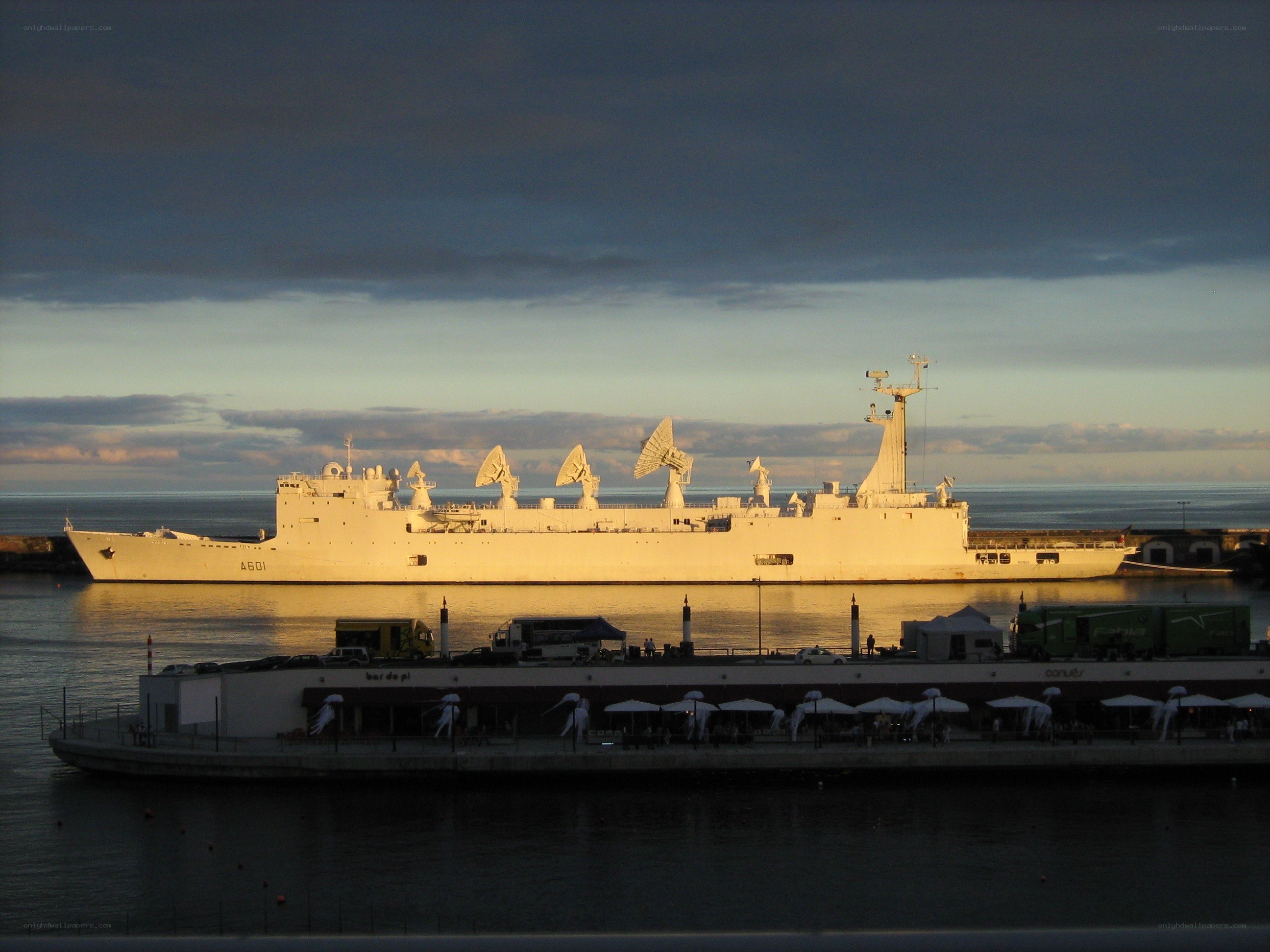 Military ship docked at harbor