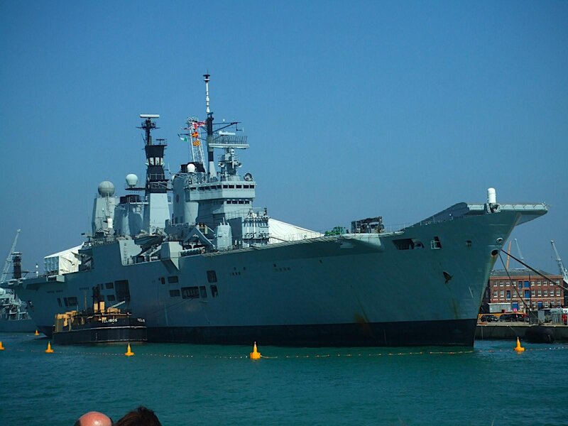 Military Ship in Harbor — Blue
