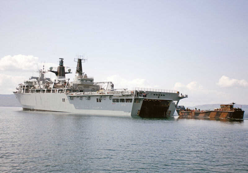 Military Ship in Harbor — Gray, Calm, Afternoon, Photograph, Boat