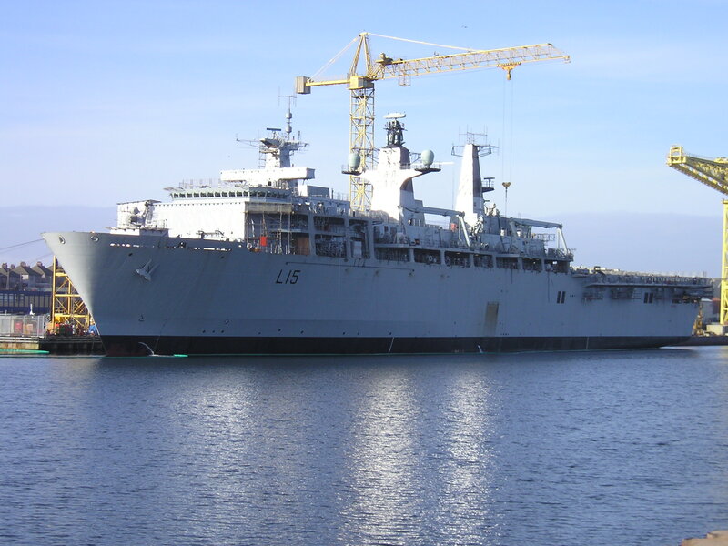 Military Ship in Harbor — Gray, Calm, Afternoon