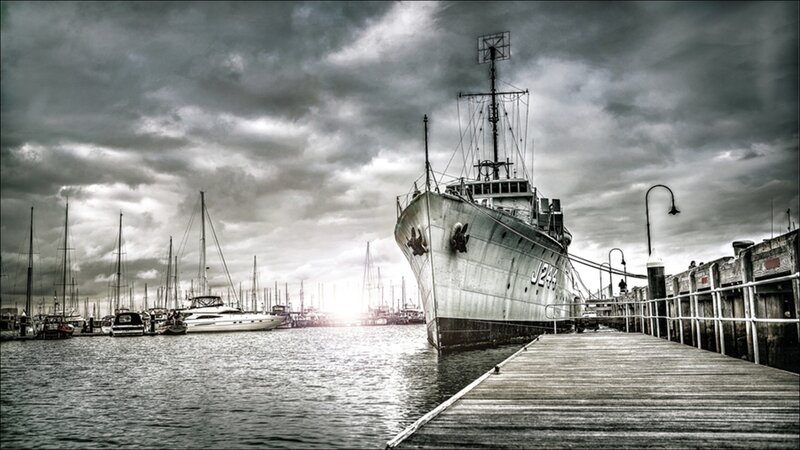 Military Ship in Harbor — Gray, Dramatic