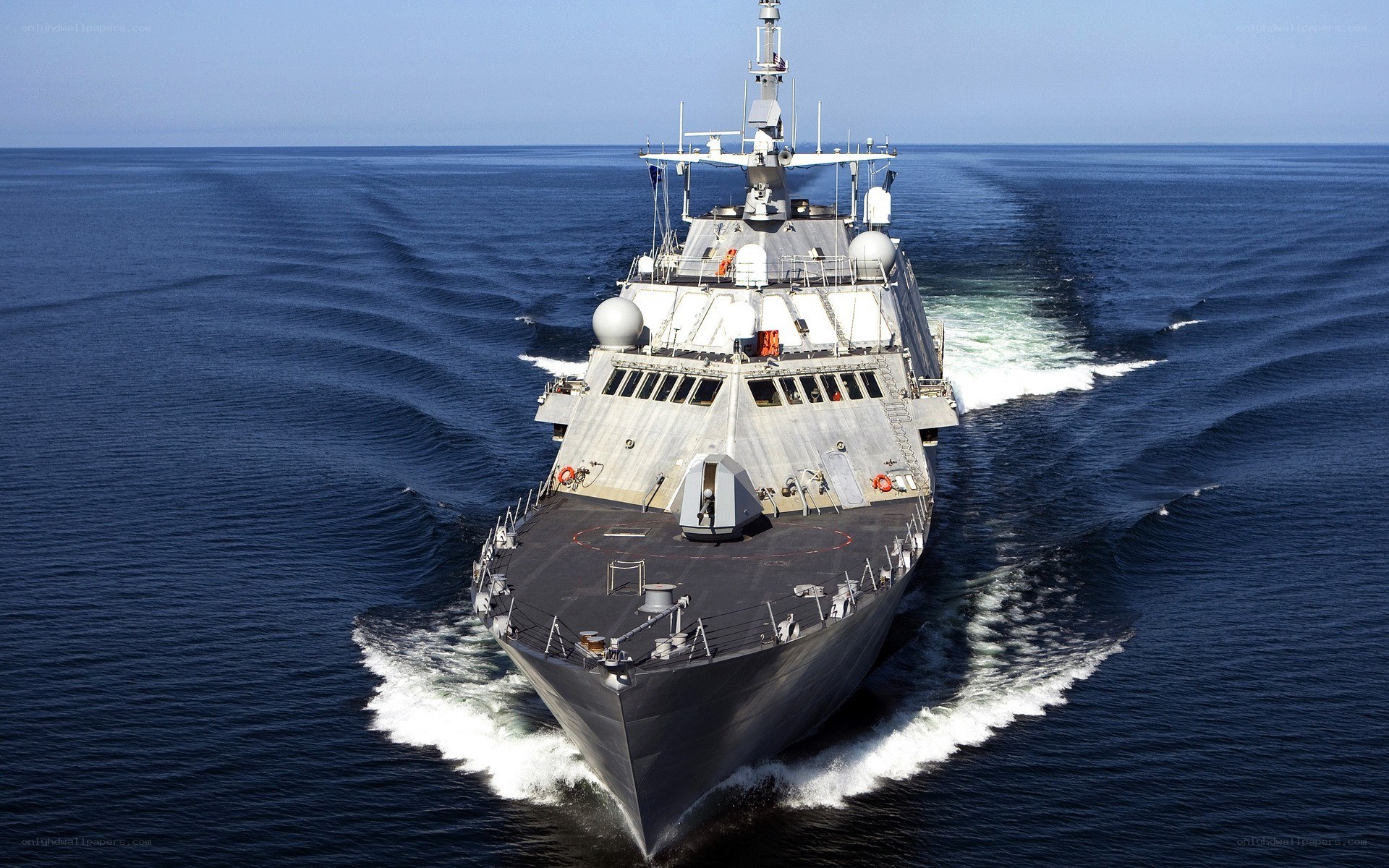 Military ship sailing on ocean