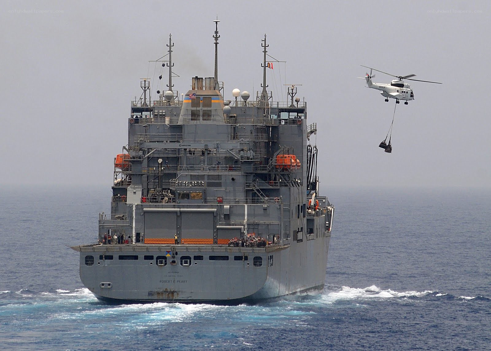 Military ship with helicopter