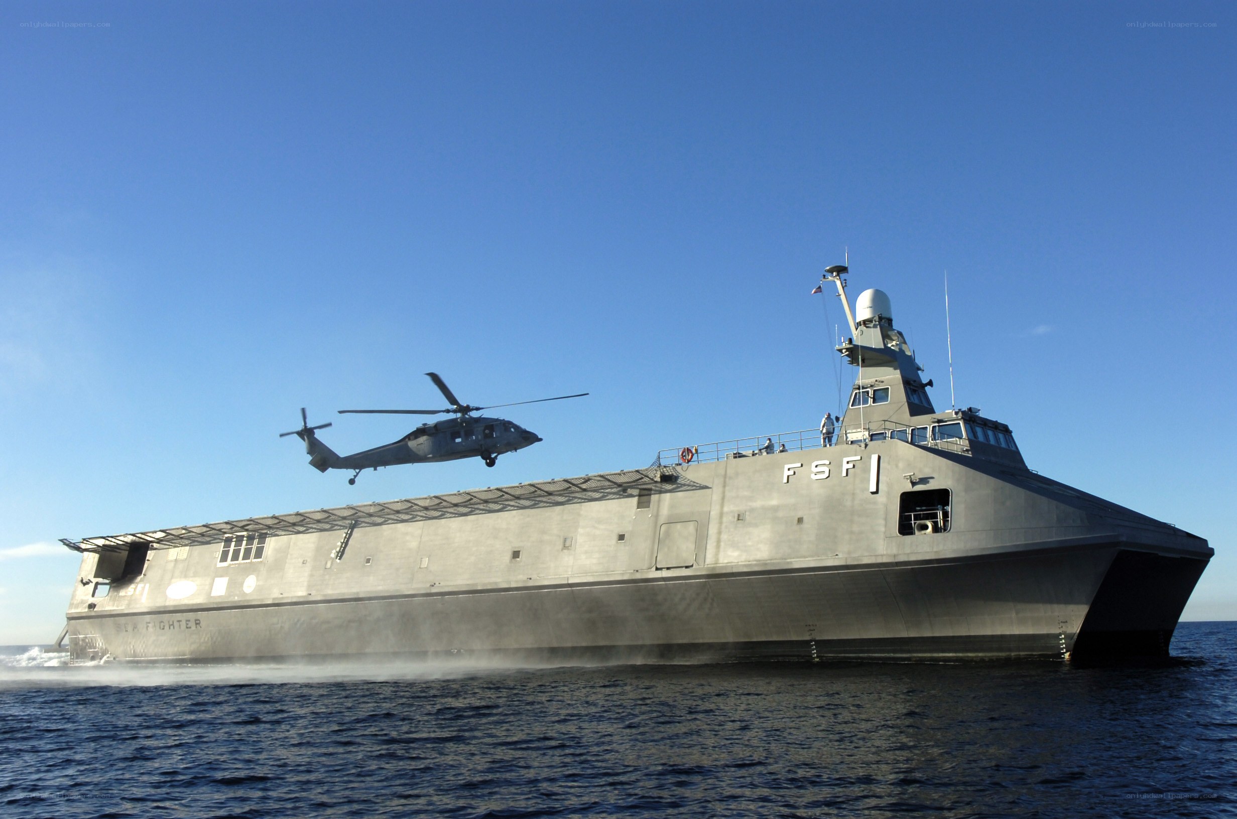 Military ship with helicopter