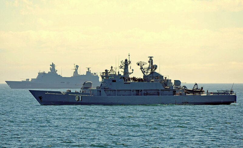 Military Ships at Sea — Blue, Calm, Sunset
