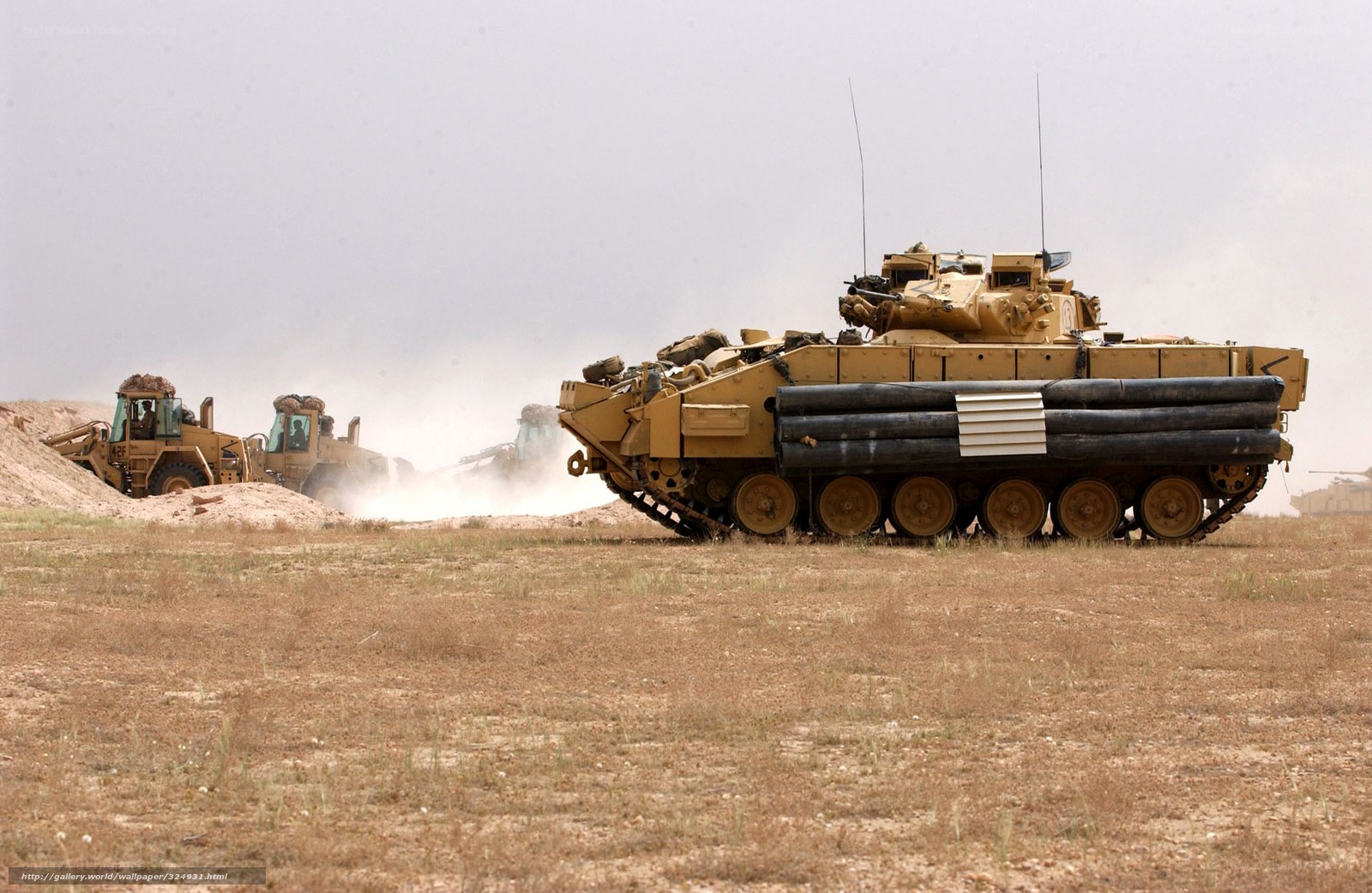 Military tank and construction vehicles