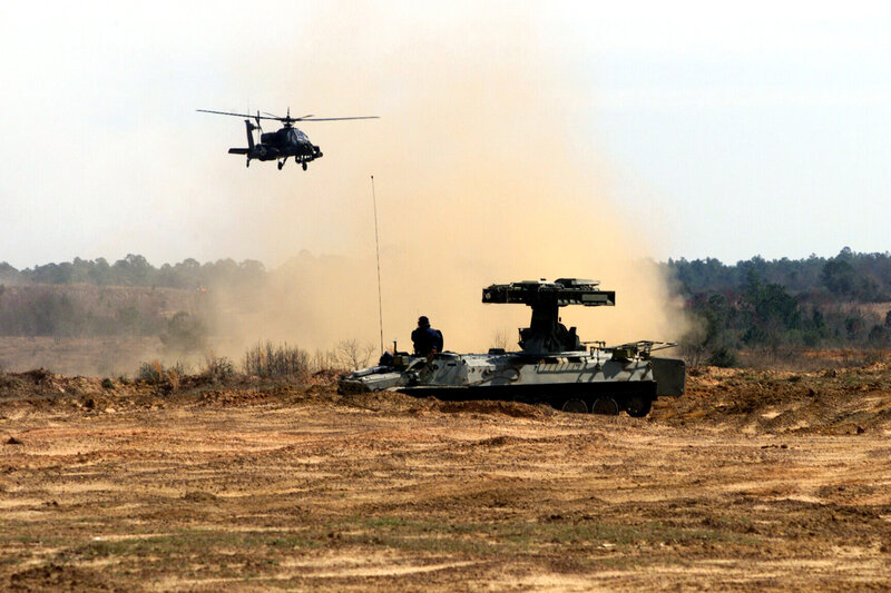 Military Tank and Helicopter