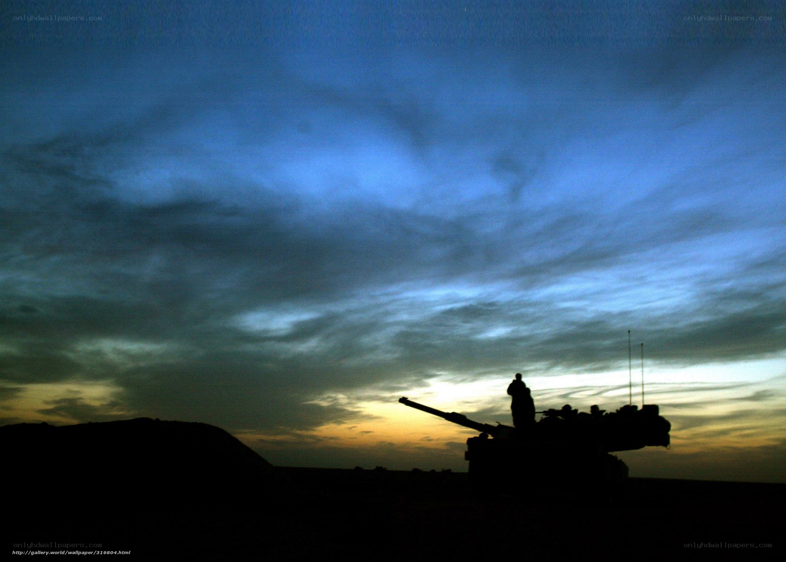 Military tank at dusk