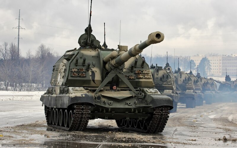 Military tank convoy in winter