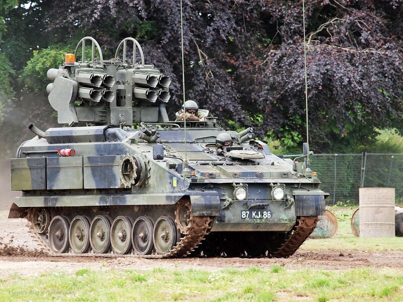 Military tank in action