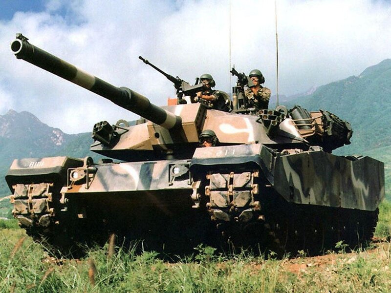 Military tank in field