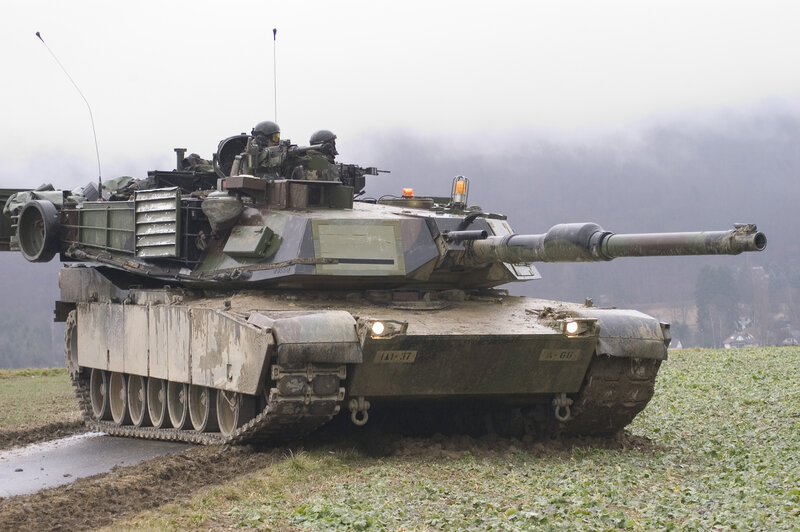 Military tank in field