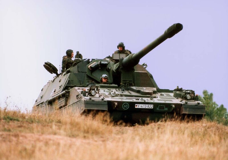 Military tank in field