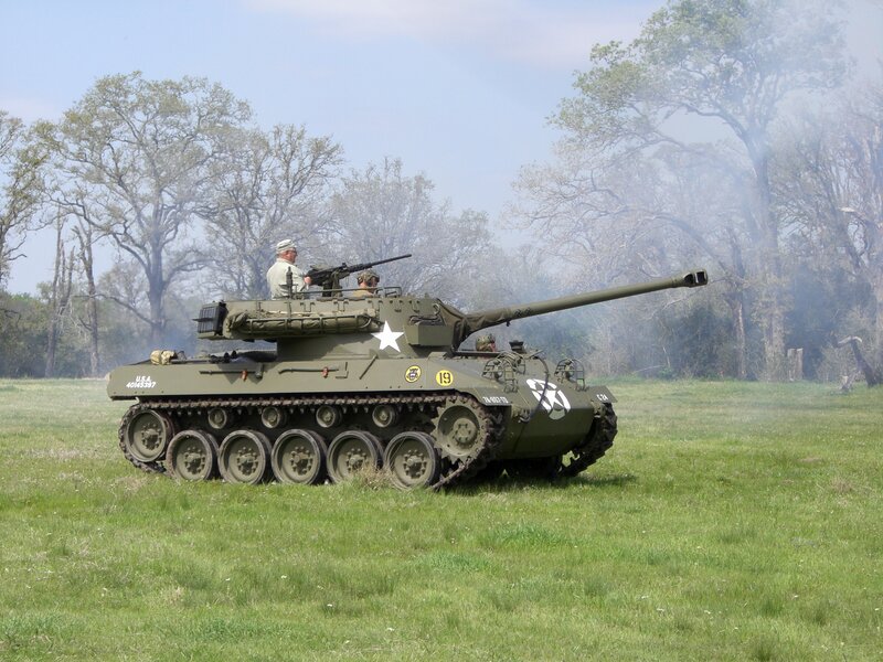 Military tank in field