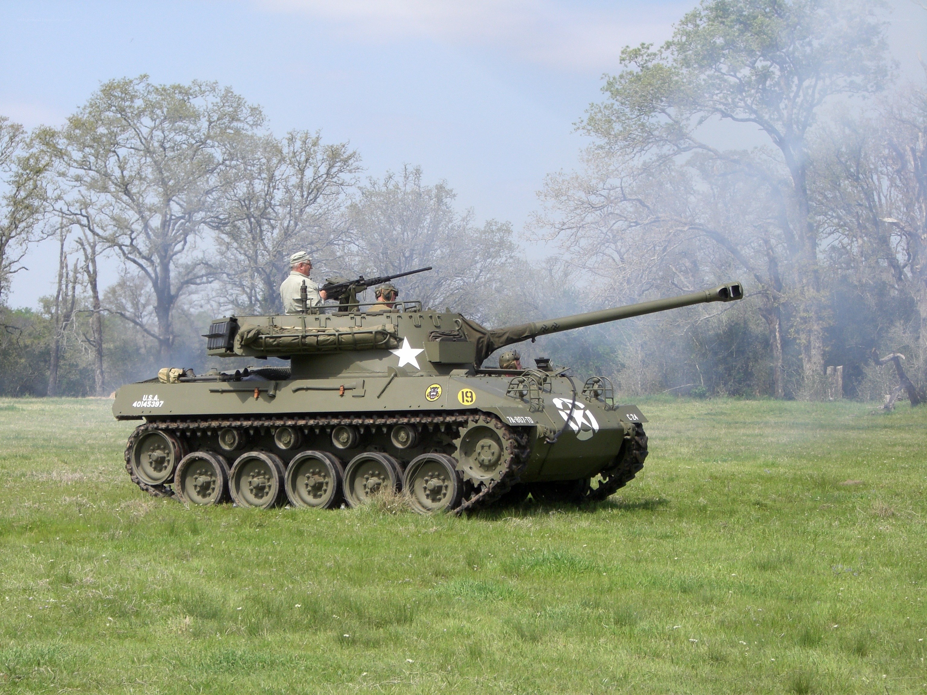 Military tank in field