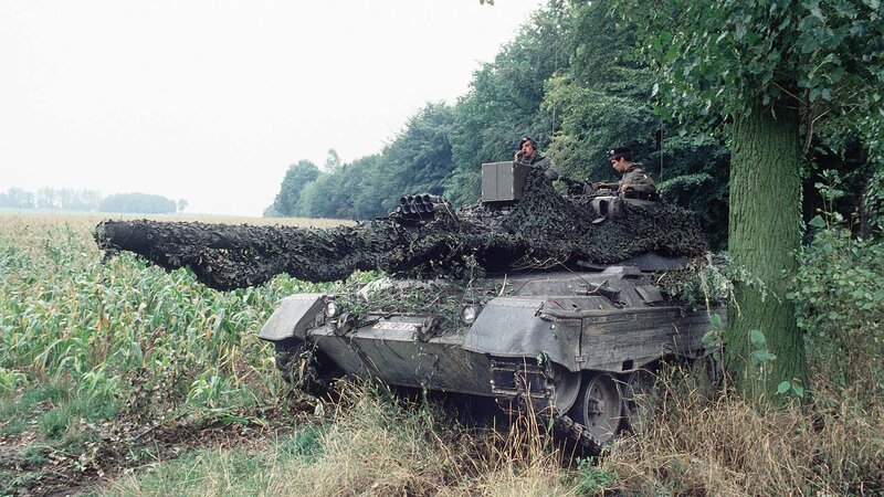 Military Tank in Field — Green, Tense