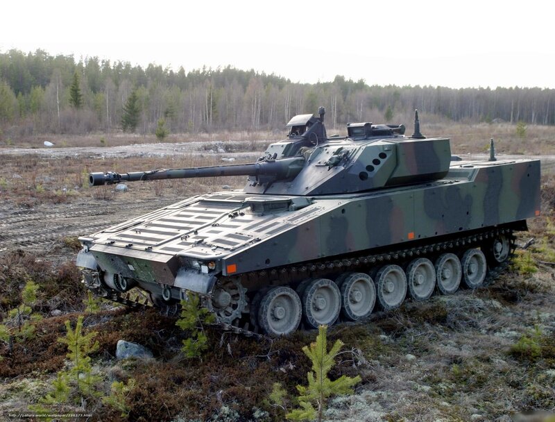 Military tank in forested area