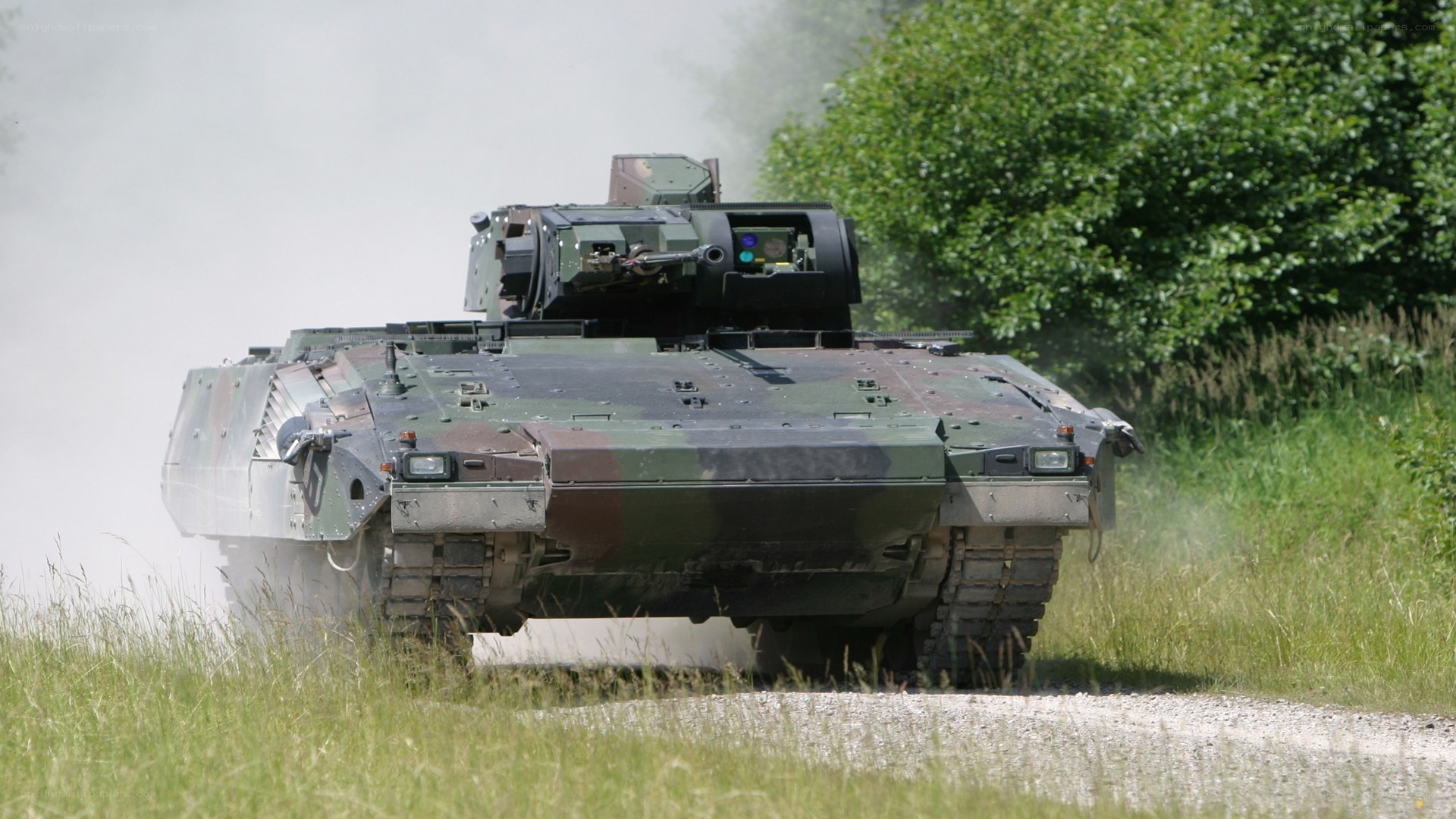 Military tank in motion