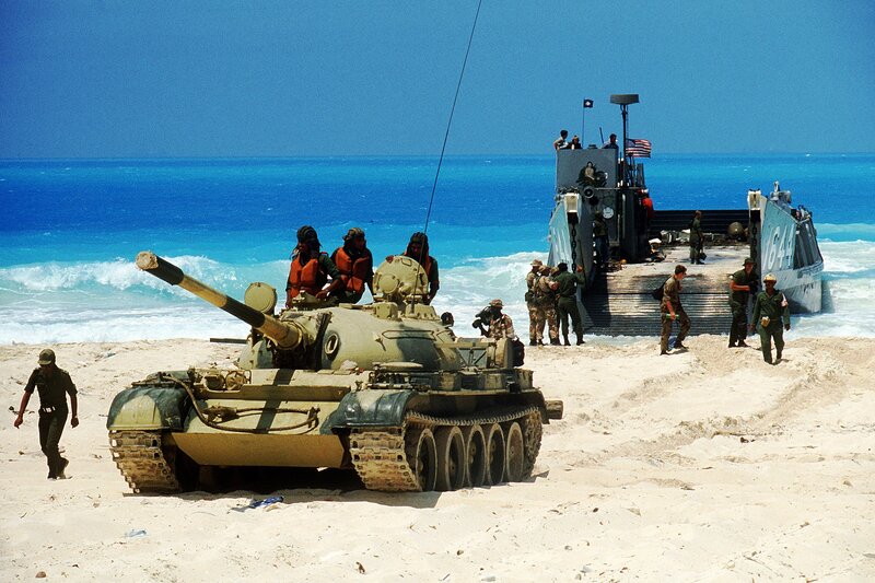 Military tank landing on beach