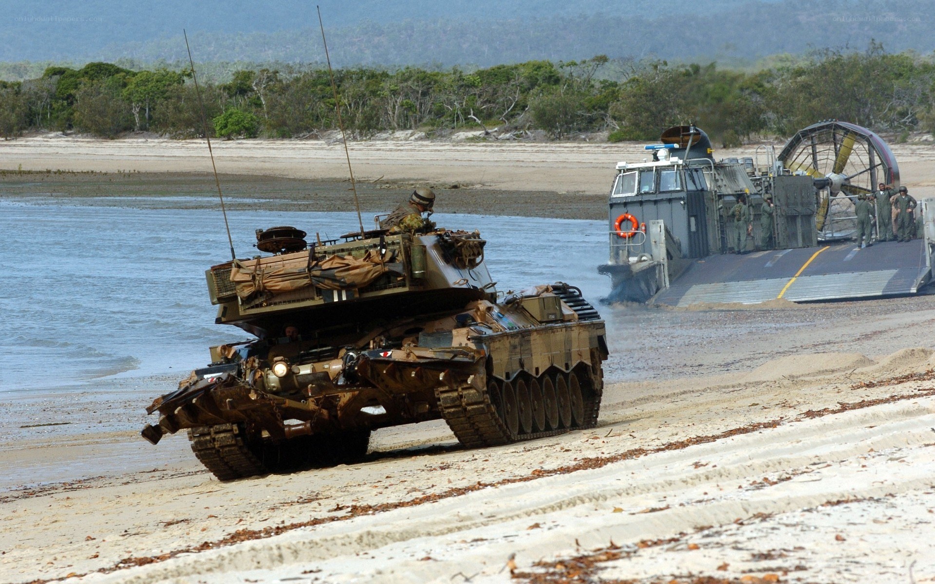 Military tank on beach