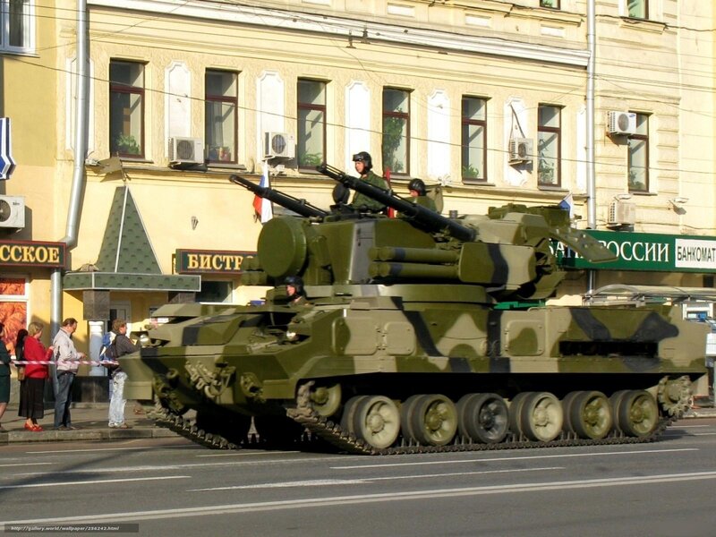 Military tank on city street