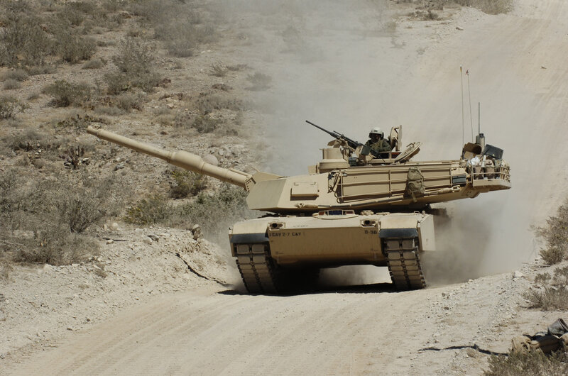 Military Tank on Dirt Road — Tan