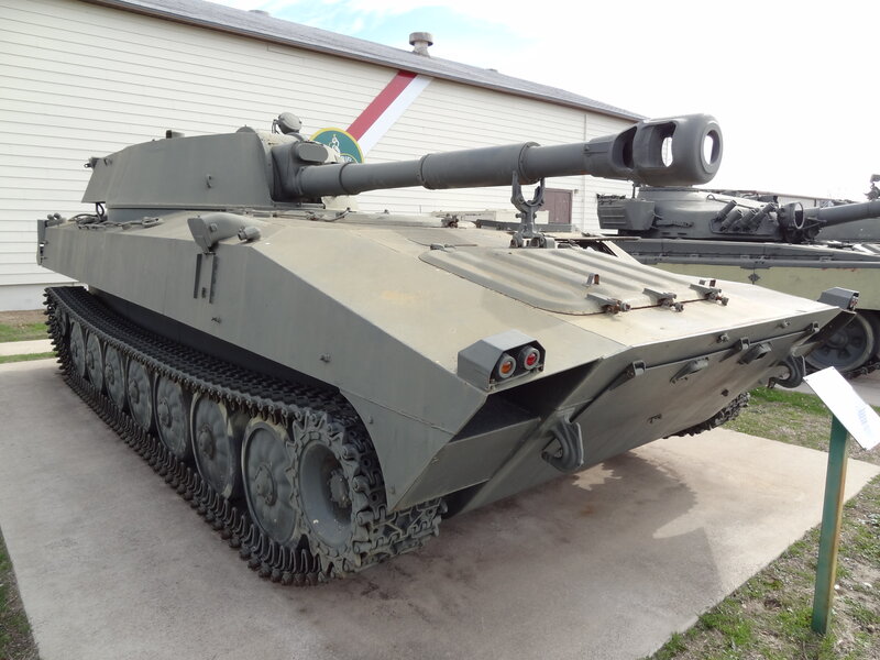 Military Tank on Display — Green, Neutral, Afternoon