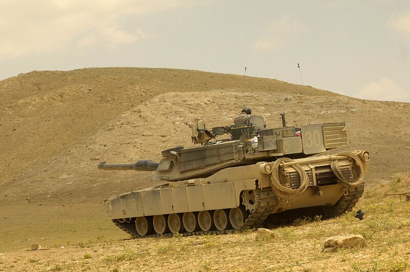 Military Tank on Hillside — Tan