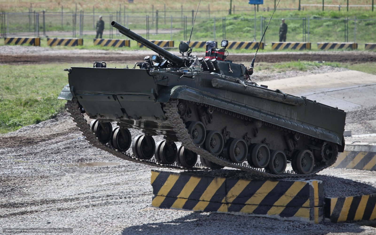 Military tank on obstacle course