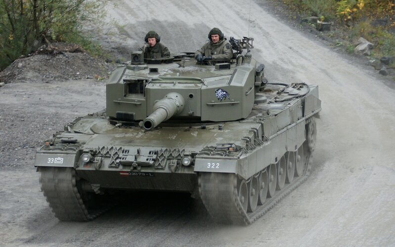 Military Tank on Road — Green, Serious