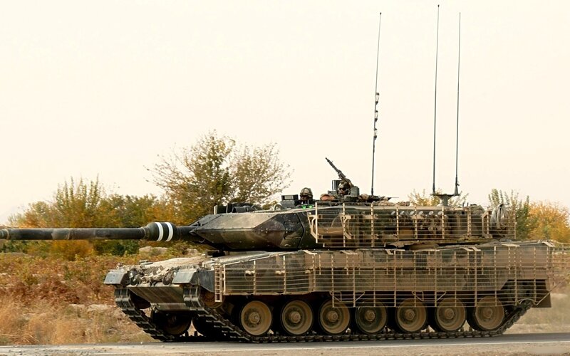 Military Tank on Road — Green