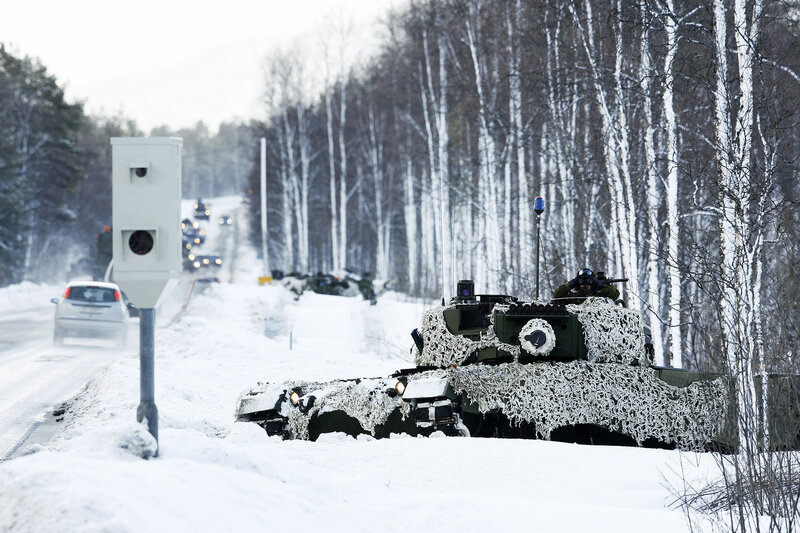 Military tank on snowy road