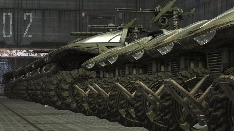 Military tanks in a hangar
